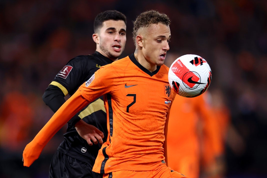ROTTERDAM, NETHERLANDS: Noa Lang of Netherlands in action against, Julian Valarino of Gibraltar during the 2022 FIFA World Cup Qualifier match between Netherlands and Gibraltar at De Kuip on October 11, 2021. (Photo by Dean Mouhtaropoulos/Getty Images)