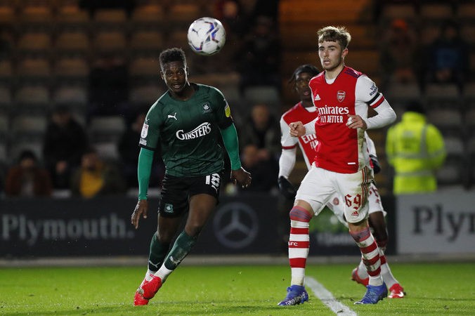 Kieran Agard of Plymouth Argyle battles for the ball with Zak Swanson of Arsenal U21 during the Papa John's Trophy Group stage match between Plymouth Argyle and Arsenal U21 on Tuesday 2nd November 2021, Home Park, Plymouth, Devon - Photo: Dave Rowntree / PPAUK