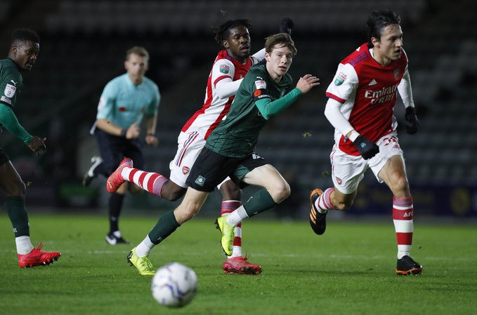 Rhys Shirley of Plymouth Argyle battles for the ball with Tim Akinola of Arsenal U21 during the Papa John's Trophy Group stage match between Plymouth Argyle and Arsenal U21 on Tuesday 2nd November 2021, Home Park, Plymouth, Devon - Photo: Dave Rowntree / PPAUK