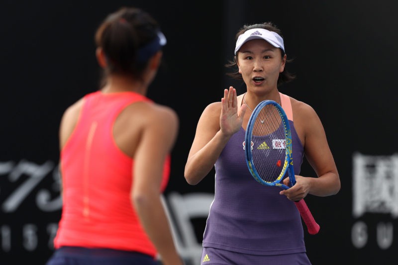 MELBOURNE, AUSTRALIA - JANUARY 23: Shuai Peng and Shuai Zhang of China during their Women's Doubles first round match against Veronika Kudermetova of Russia and Alison Riske of the United States on day four of the 2020 Australian Open at Melbourne Park on January 23, 2020 in Melbourne, Australia. (Photo by Clive Brunskill/Getty Images)