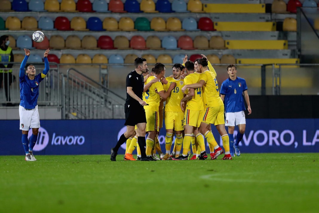 FROSINONE, ITALY: Ianis Ilie Stoica of Romania celebrates with his teammates after scoring the opening goal during the international friendly match between Italy U21 and Romania U21 at Stadio Benito Stirpe on November 16, 2021. (Photo by Paolo Bruno/Getty Images)