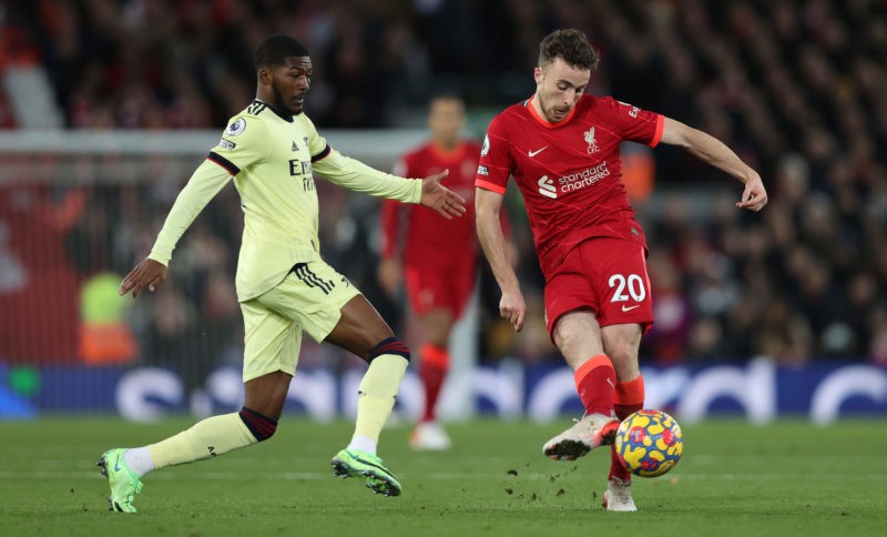 LIVERPOOL, ENGLAND - NOVEMBER 20: Diogo Jota of Liverpool passes the ball during the Premier League match between Liverpool and Arsenal at Anfield on November 20, 2021 in Liverpool, England. (Photo by Clive Brunskill/Getty Images)