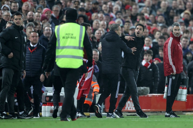 LIVERPOOL, ENGLAND - NOVEMBER 20: Mikel Arteta, Manager of Arsenal gestures to Juergen Klopp, Manager of Liverpool during the Premier League match between Liverpool and Arsenal at Anfield on November 20, 2021 in Liverpool, England. (Photo by Clive Brunskill/Getty Images)