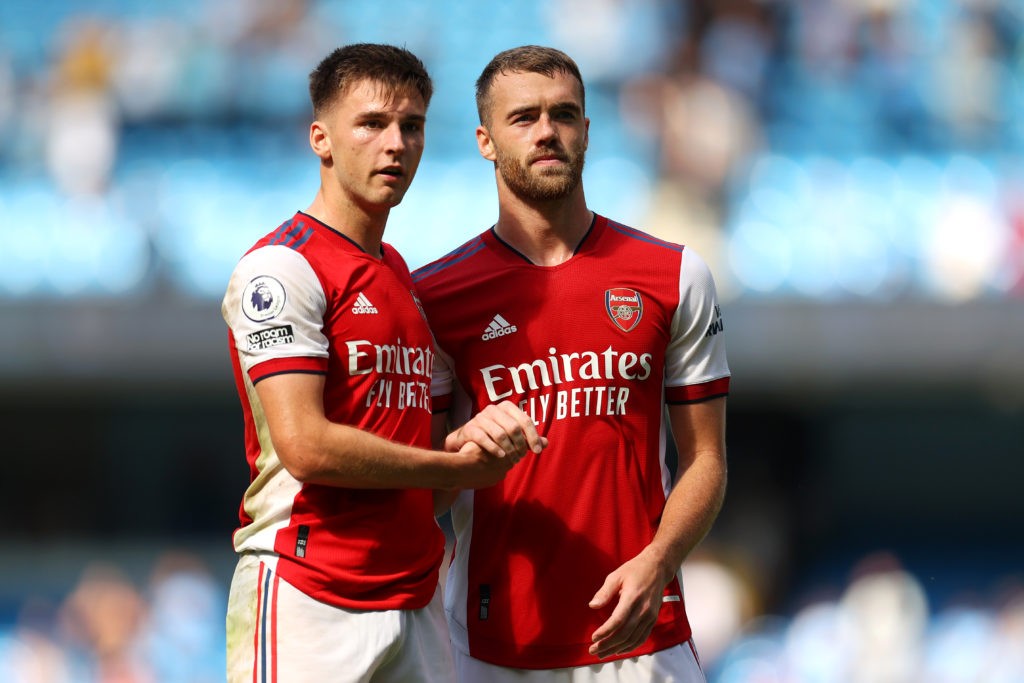 MANCHESTER, ENGLAND - AUGUST 28: Kieran Tierney and Calum Chambers of Arsenal interact during the Premier League match between Manchester City and Arsenal at Etihad Stadium on August 28, 2021 in Manchester, England. (Photo by Catherine Ivill/Getty Images)