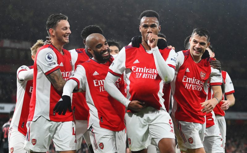 LONDON, ENGLAND - DECEMBER 11: Gabriel Magalhaes of Arsenal celebrates with teammates Ben White, Alexandre Lacazette and Granit Xhaka after scoring their side's third goal during the Premier League match between Arsenal and Southampton at Emirates Stadium on December 11, 2021 in London, England. (Photo by Justin Setterfield/Getty Images)
