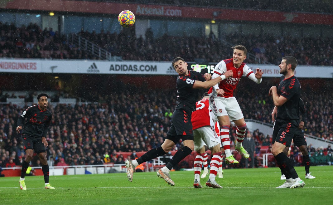 LONDON, ENGLAND - DECEMBER 11: Martin Odegaard of Arsenal scores their side's second goal during the Premier League match between Arsenal and Southampton at Emirates Stadium on December 11, 2021 in London, England. (Photo by Eddie Keogh/Getty Images)