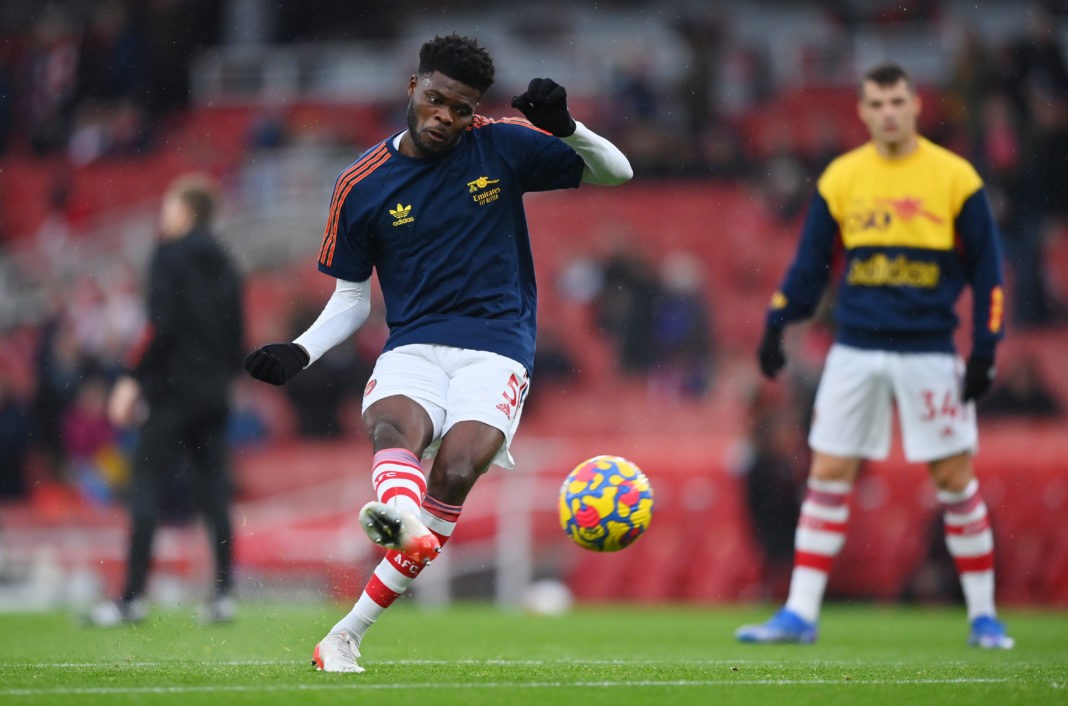 LONDON, ENGLAND: Thomas Partey of Arsenal shoots during the warm up prior to the Premier League match between Arsenal and Southampton at Emirates Stadium on December 11, 2021. (Photo by Justin Setterfield / Getty Images)