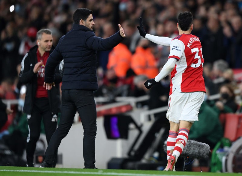 LONDON, ENGLAND - DECEMBER 15: Gabriel Martinelli celebrates with Mikel Arteta, Manager of Arsenal after scoring their team's first goal during the Premier League match between Arsenal and West Ham United at Emirates Stadium on December 15, 2021 in London, England. (Photo by Justin Setterfield/Getty Images)