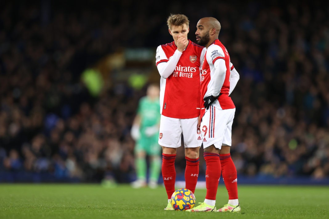 LIVERPOOL, ENGLAND - DECEMBER 06: (L - R) Martin Odegaard and Alexandre Lacazette of Arsenal speak before taking a free kick during the Premier League match between Everton and Arsenal at Goodison Park on December 06, 2021 in Liverpool, England. (Photo by Naomi Baker/Getty Images)