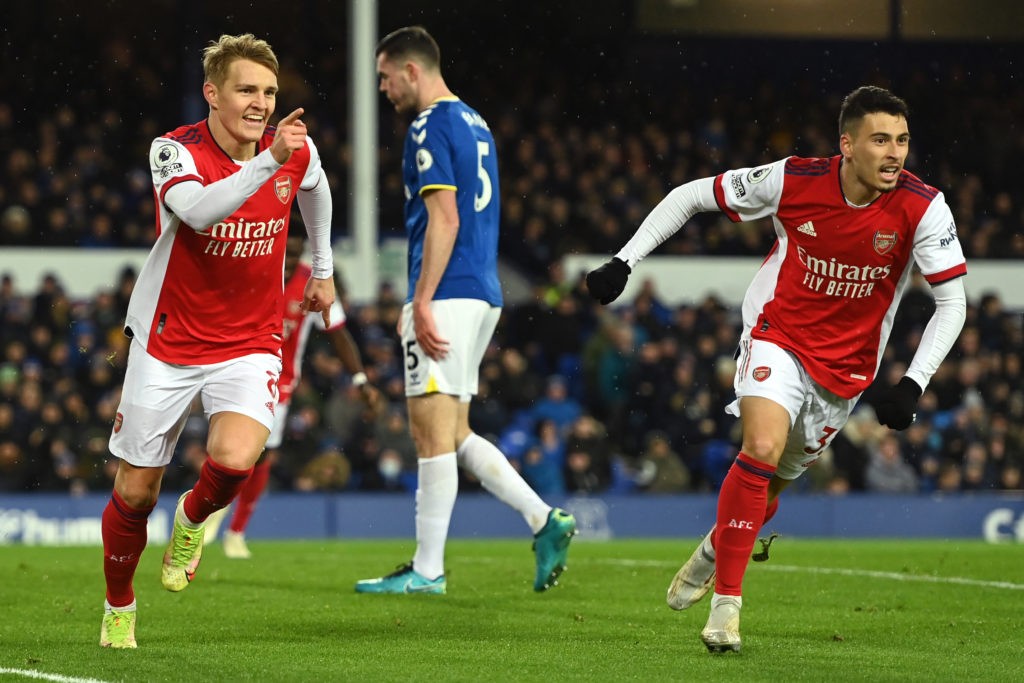 LIVERPOOL, ENGLAND - DECEMBER 06: Martin Odegaard (L) of Arsenal celebrates with teammate Gabriel Martinelli after scoring their side's first goal during the Premier League match between Everton and Arsenal at Goodison Park on December 06, 2021 in Liverpool, England. (Photo by Gareth Copley/Getty Images)