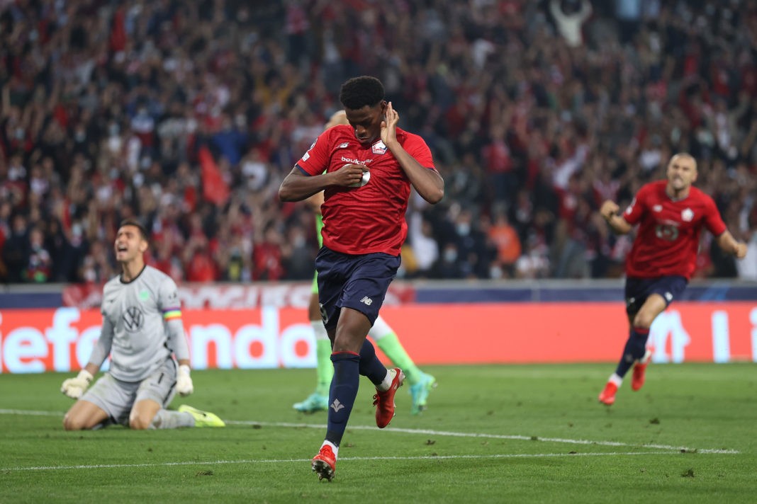 LILLE, FRANCE: Jonathan David of Lille celebrates scoring a goal which is later disallowed by VAR during the UEFA Champions League group G match between Lille OSC and VfL Wolfsburg at Stade Pierre-Mauroy on September 14, 2021. (Photo by Lars Baron / Getty Images)