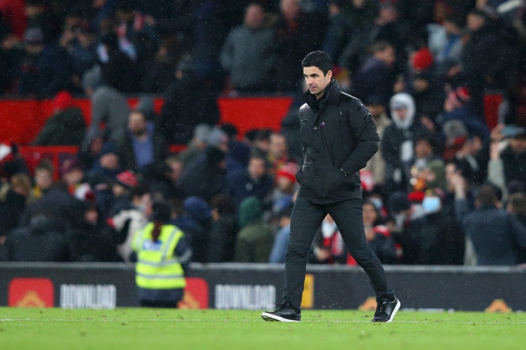 MANCHEavSTER, ENGLAND - DECEMBER 02: Mikel Arteta, Manager of Arsenal walks onto the pitch after their sides defeat in the Premier League match between Manchester United and Arsenal at Old Trafford on December 02, 2021 in Manchester, England. (Photo by Alex Livesey/Getty Images)