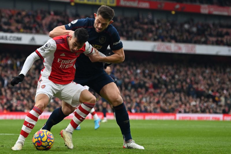 Arsenal's Brazilian striker Gabriel Martinelli (L) vies with Burnley's English defender James Tarkowski (R) during the English Premier League football match between Arsenal and Burnley at the Emirates Stadium in London on January 23, 2022. (Photo by GLYN KIRK/AFP via Getty Images)