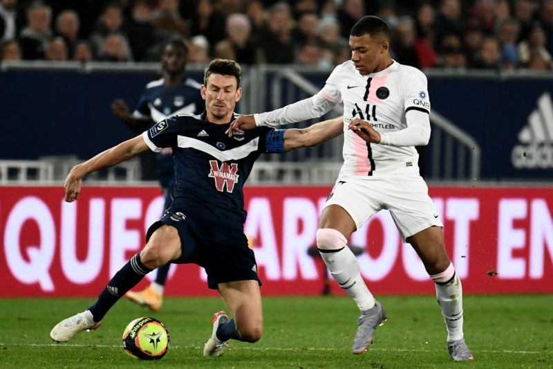 Bordeaux's French defender Laurent Koscielny (L) fights for the ball against Paris Saint-Germain's French forward Kylian Mbappe during the French L1 football match between FC Girondins de Bordeaux and Paris Saint-Germain at The Matmut Atlantique Stadium in Bordeaux, south-western France on November 6, 2021. (Photo by Philippe LOPEZ / AFP) (Photo by PHILIPPE LOPEZ/AFP via Getty Images)