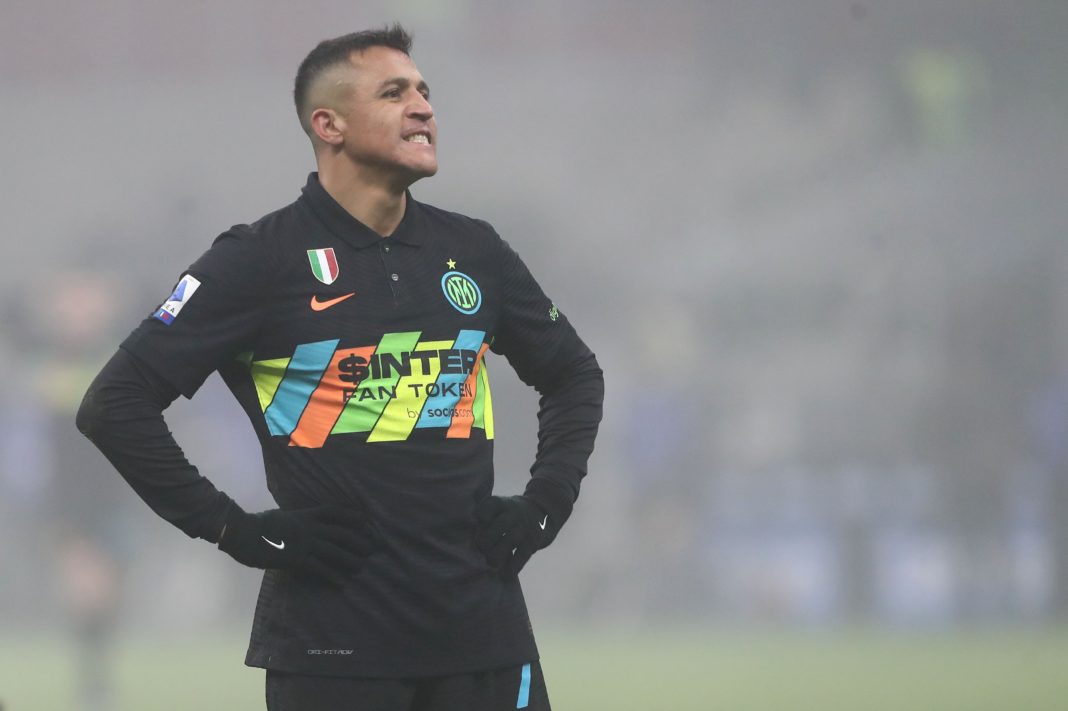 MILAN, ITALY - DECEMBER 22: Alexis Sanchez of FC Internazionale FC reacts during the Serie A match between FC Internazionale and Torino FC at Stadio Giuseppe Meazza on December 22, 2021 in Milan, Italy. (Photo by Marco Luzzani/Getty Images)