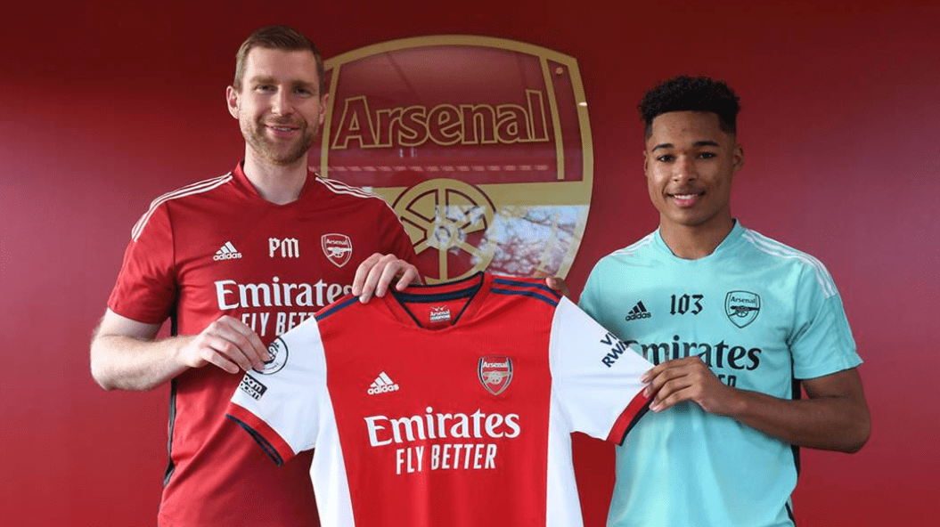 Per Mertesacker with Reuell Walters after the youngster's new professional deal signing (Photo via Arsenal.com)