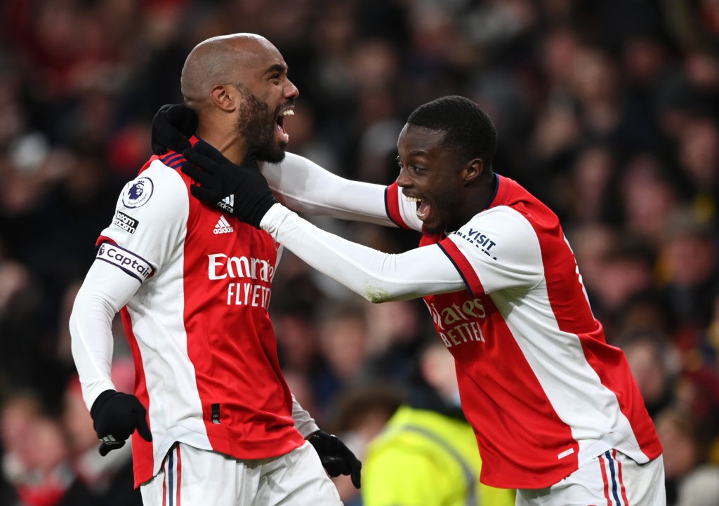 LONDON, ENGLAND - FEBRUARY 24: Alexandre Lacazette of Arsenal celebrates their sides second goal with team mate Nicolas Pepe during the Premier League match between Arsenal and Wolverhampton Wanderers at Emirates Stadium on February 24, 2022 in London, England. (Photo by Shaun Botterill/Getty Images)