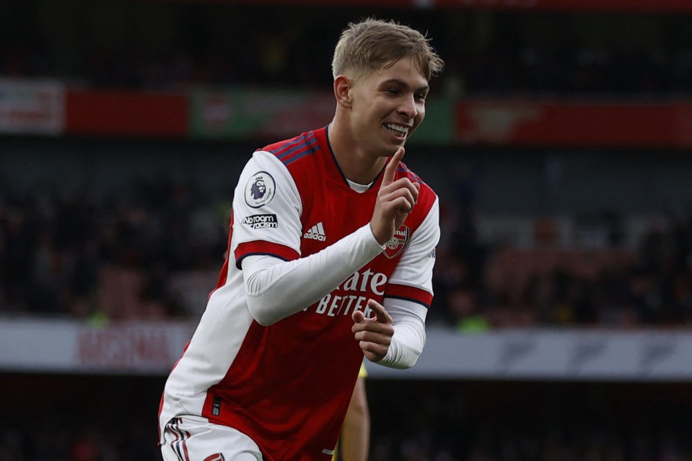 Arsenal's English midfielder Emile Smith Rowe celebrates after scoring the opening goal of the English Premier League football match between Arsenal and Brentford at the Emirates Stadium in London on February 19, 2022. (Photo by IAN KINGTON / AFP via Getty Images)