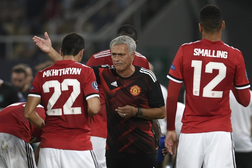 Manchester United's Portuguese manager Jose Mourinho (C) gives his instructions to Manchester United's Armenian midfielder Henrikh Mkhitaryan (L) during the UEFA Super Cup football match between Real Madrid and Manchester United on August 8, 2017, at the Philip II Arena in Skopje. / AFP PHOTO / Nikolay DOYCHINOV