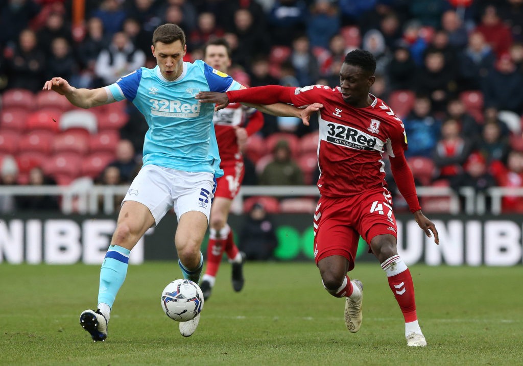 MIDDLESBROUGH, ENGLAND: Folarin Balogun (R) of Middlesbrough in action with Krystian Bielik of Derby County during the Sky Bet Championship match between Middlesbrough and Derby County at Riverside Stadium on February 12, 2022. (Photo by Nigel Roddis / Getty Images)