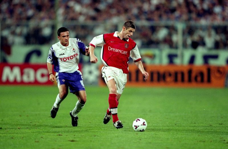14 Sep 1999: Oleg Luzhnyi of Arsenal is tracked by Predrag Mijatovic of Fiorentina during the UEFA Champions League group B match at the Stadio Communale in Florence, Italy. The game ended goalless. Mandatory Credit: Gary M Prior/Allsport