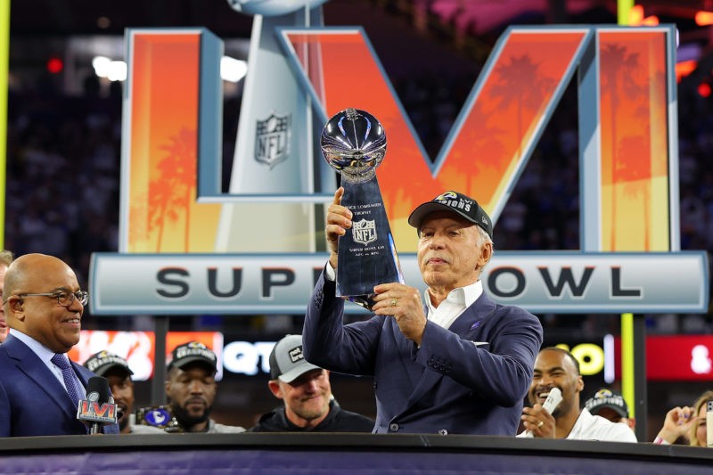 INGLEWOOD, CALIFORNIA - FEBRUARY 13: Owner of the Los Angeles Rames Stan Kroenke holds up the Vince Lombardi Trophy after Super Bowl LVI at SoFi Stadium on February 13, 2022 in Inglewood, California. The Los Angeles Rams defeated the Cincinnati Bengals 23-20. (Photo by Kevin C. Cox/Getty Images)