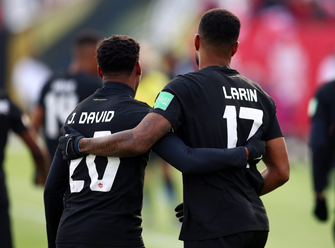 HAMILTON, ON - JANUARY 30: Cyle Larin #17 of Canada celebrates his goal with Jonathan David #20 during a 2022 World Cup Qualifying match against the United States at Tim Hortons Field on January 30, 2022 in Hamilton, Ontario, Canada. (Photo by Vaughn Ridley/Getty Images)