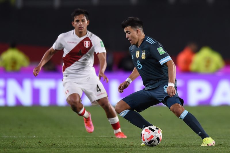 BUENOS AIRES, ARGENTINA - OCTOBER 14: Marcos Acuña of Argentina controls the ball as Jhilmar Lora of Peru defends during a match between Argentina and Peru as part of South American Qualifiers for Qatar 2022 at Estadio Monumental Antonio Vespucio Liberti on October 14, 2021 in Buenos Aires, Argentina. (Photo by Marcelo Endelli/Getty Images)