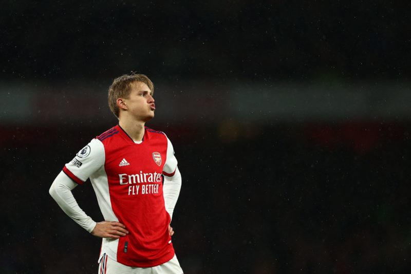Arsenal's Norwegian midfielder Martin Odegaard reacts during the English Premier League football match between Arsenal and Liverpool at the Emirates Stadium in London on March 16, 2022. (Photo by ADRIAN DENNIS/AFP via Getty Images)