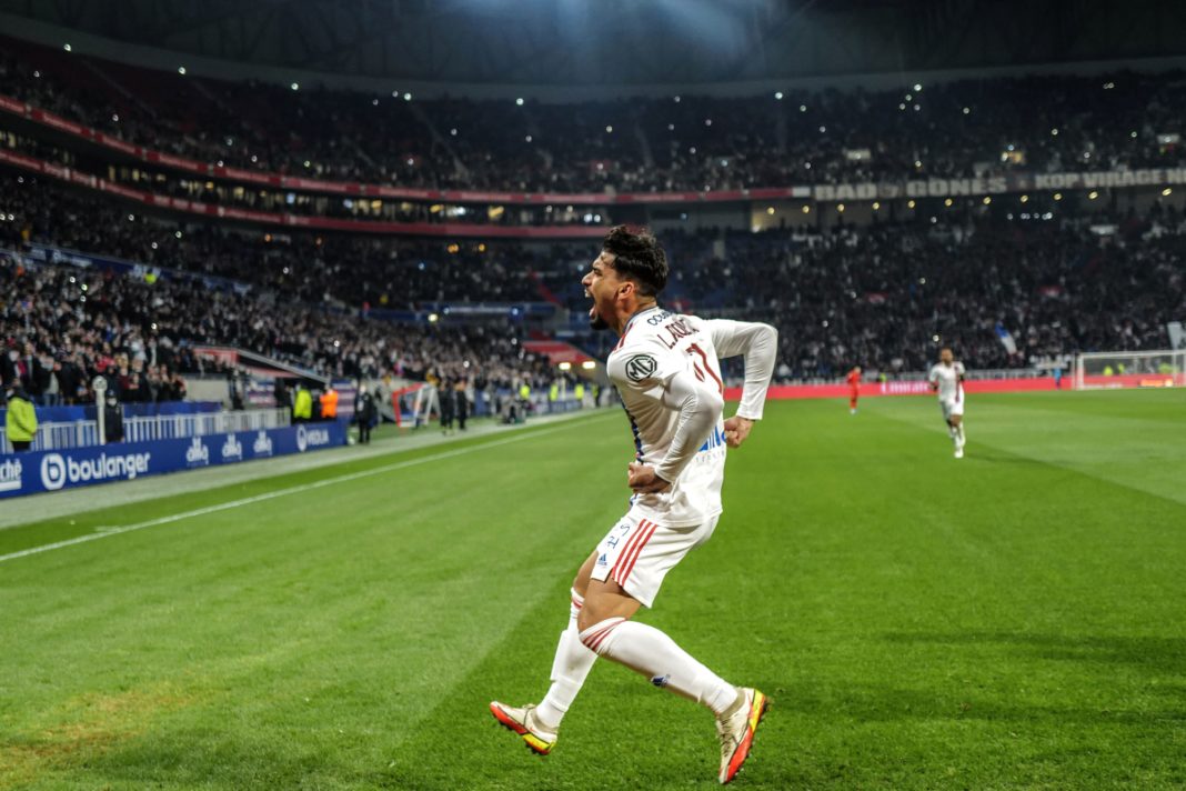 Lyon's Brazilian midfielder Lucas Paqueta celebrates during the French L1 football match between Olympique Lyonnais (OL) and OGC Nice at The Groupama Stadium in Decines-Charpieu, central-eastern France on February 12, 2022. (Photo by OLIVIER CHASSIGNOLE / AFP)