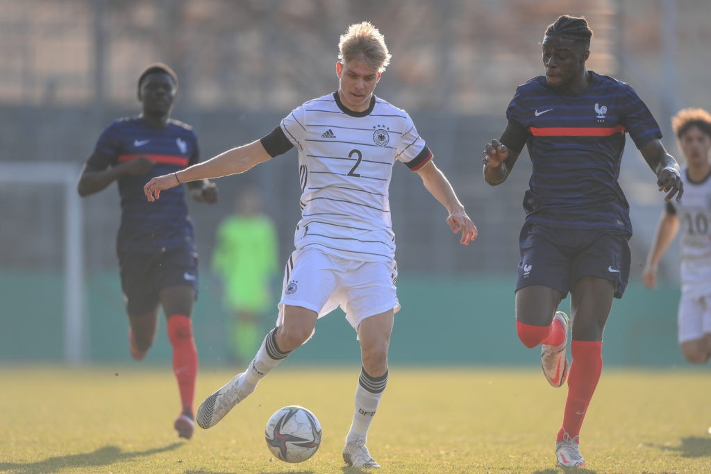STUTTGART, GERMANY: Stefano Morgalla of Germany challenges Chimuanya Ugochukwu of France during the international friendly match between Germany U18 and France U18 at GAZI-Stadion on March 24, 2022. (Photo by Christian Kaspar-Bartke/Getty Images for DFB)