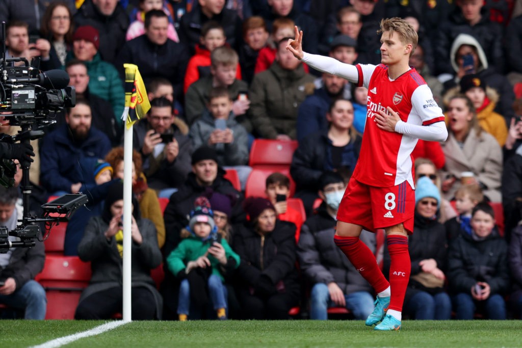 WATFORD, ENGLAND - MARCH 06: Martin Odegaard of Arsenal celebrates after scoring their side's first goal during the Premier League match between Watford and Arsenal at Vicarage Road on March 06, 2022 in Watford, England. (Photo by Alex Pantling/Getty Images)