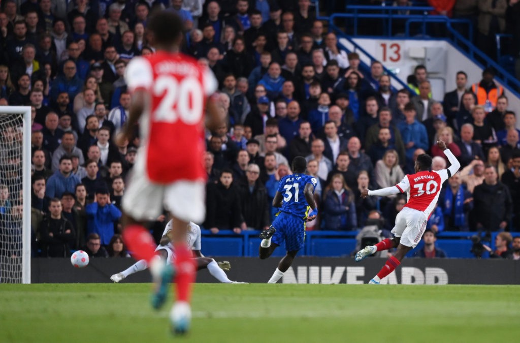 LONDON, ENGLAND: Eddie Nketiah of Arsenal scores their team's first goal past Edouard Mendy of Chelsea (obscured) during the Premier League match between Chelsea and Arsenal at Stamford Bridge on April 20, 2022. (Photo by Justin Setterfield/Getty Images)