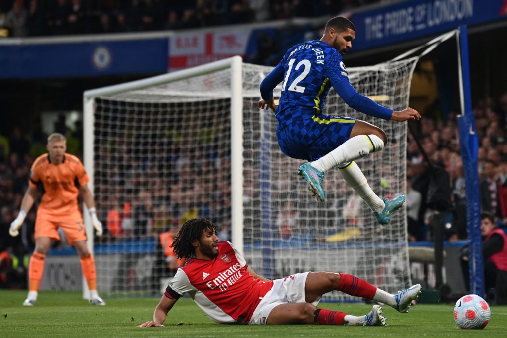 Chelsea's English midfielder Ruben Loftus-Cheek (R) vies with Arsenal's Egyptian midfielder Mohamed Elneny (C) during the English Premier League football match between Chelsea and Arsenal at Stamford Bridge in London on April 20, 2022. (Photo by GLYN KIRK/AFP via Getty Images)