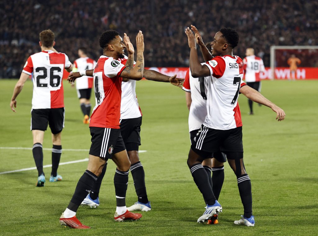 Feyenoord's Reiss Nelson (2nd L) and Luis Sinisterra (R) celebrate during the UEFA Conference League semi-final football match between Feyenoord and Olympique Marseille (OM) at De Kuip stadium in Rotterdam, on April 28, 2022. (Photo by MAURICE VAN STEEN/ANP/AFP via Getty Images)