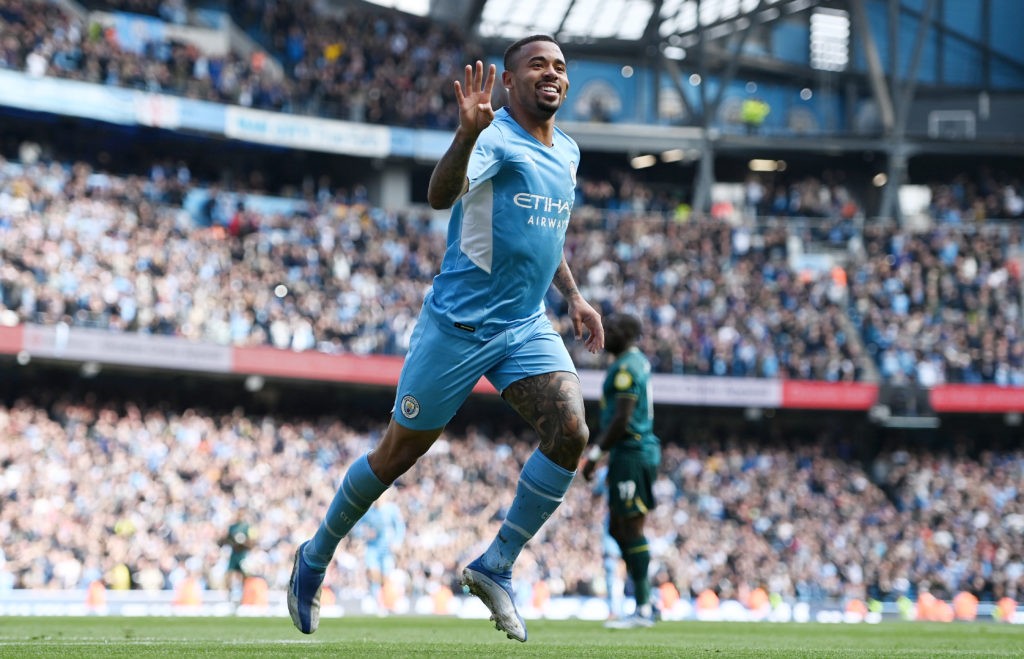 MANCHESTER, ENGLAND: Gabriel Jesus of Manchester City celebrates after scoring their side's fifth goal from a penalty during the Premier League match between Manchester City and Watford at Etihad Stadium on April 23, 2022. (Photo by Gareth Copley/Getty Images,)