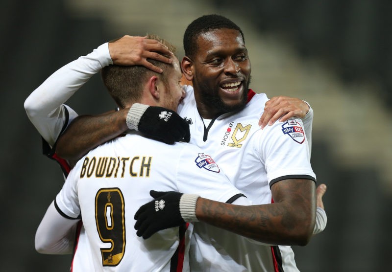 MILTON KEYNES, ENGLAND - FEBRUARY 09:  Dean Bowditch of Milton Keynes Dons is congratulated by team mate Jay Emmanuel-Thomas after scoring his sides goal during the Sky Bet Championship match between Milton Keynes Dons and Middlesbrough at StadiumMK on February 9, 2016 in Milton Keynes, England.  (Photo by Pete Norton/Getty Images)