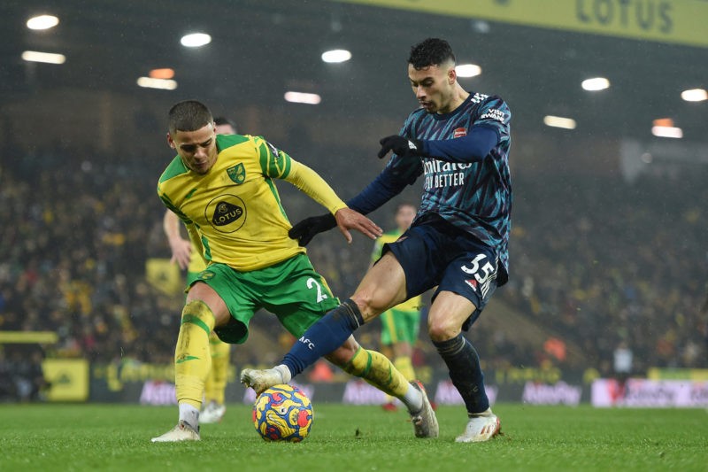 NORWICH, ENGLAND - DECEMBER 26: Gabriel Martinelli of Arsenal is challenged by Max Aarons of Norwich City during the Premier League match between Norwich City and Arsenal at Carrow Road on December 26, 2021 in Norwich, England. (Photo by Harriet Lander/Getty Images)
