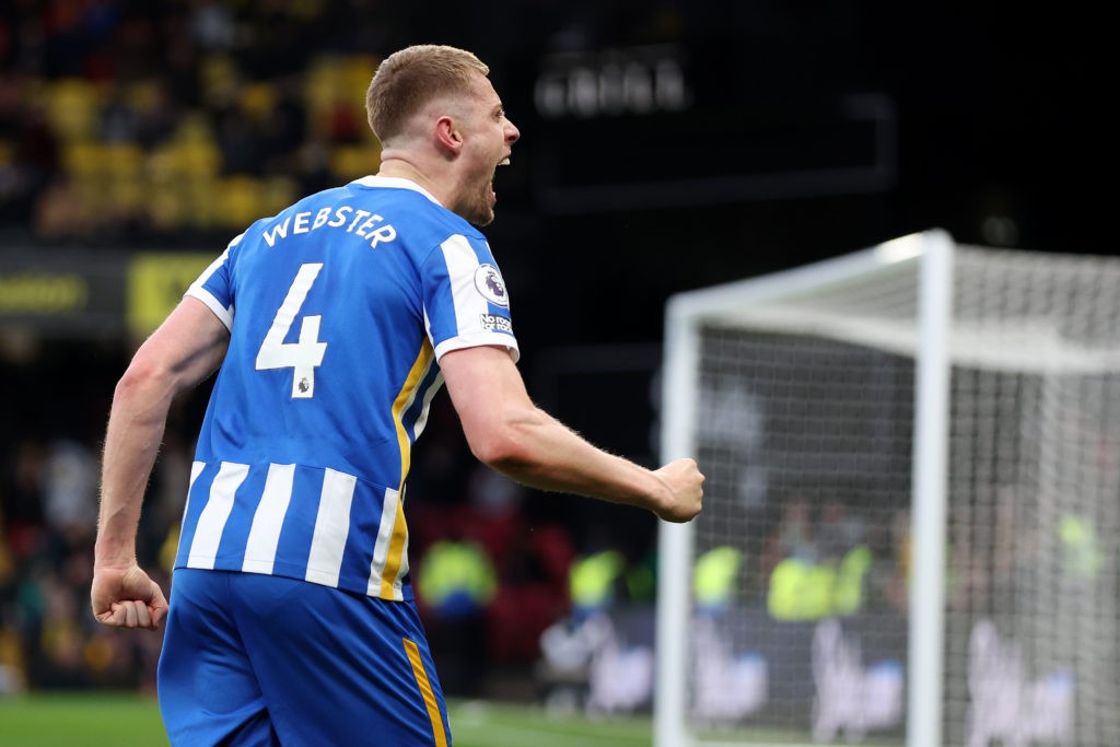 WATFORD, ENGLAND: Adam Webster of Brighton & Hove Albion celebrates after scoring their team's second goal during the Premier League match between Watford and Brighton & Hove Albion at Vicarage Road on February 12, 2022. (Photo by Mark Thompson/Getty Images)