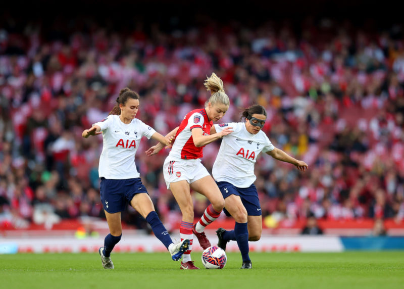 LONDON, ENGLAND - MAY 04: Leah Williamson of Arsenal battles for possession with Rosella Ayane and Rachel Williams of Tottenham Hotspur during the Barclays FA Women's Super League match between Arsenal Women and Tottenham Hotspur Women at Emirates Stadium on May 04, 2022 in London, England. (Photo by Catherine Ivill/Getty Images)