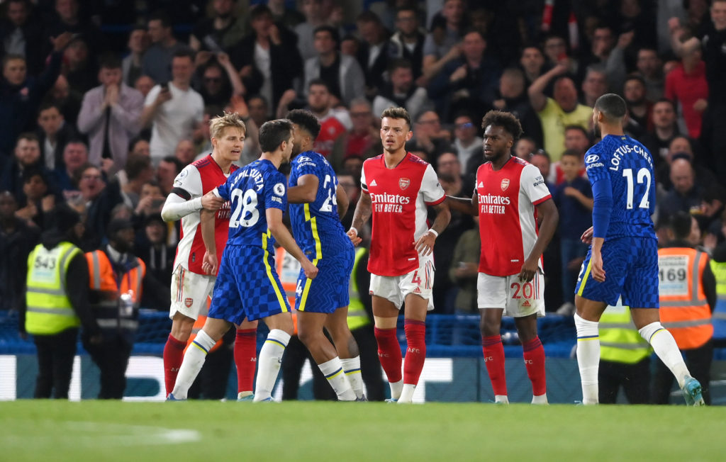 LONDON, ENGLAND: Nuno Tavares of Arsenal clashes with Cesar Azpilicueta of Chelsea after a penalty was awarded to Arsenal during the Premier League match between Chelsea and Arsenal at Stamford Bridge on April 20, 2022. (Photo by Mike Hewitt/Getty Images)