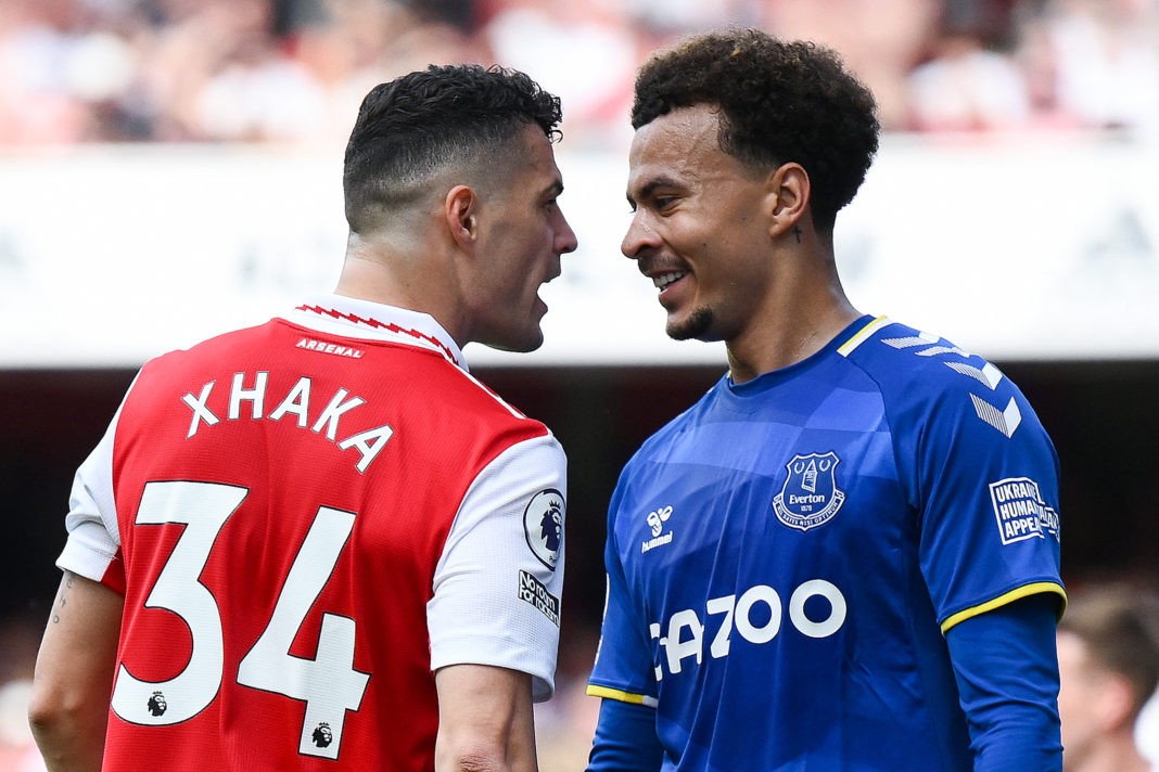 Arsenal's Swiss midfielder Granit Xhaka (L) speaks to Everton's English midfielder Dele Alli during the English Premier League football match between Arsenal and Everton at the Emirates Stadium in London on May 22, 2022. (Photo by DANIEL LEAL/AFP via Getty Images)