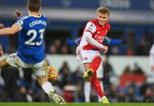 USA, Germany, Emirates Cup: Arsenal pre-season plans take shape Arsenal's Norwegian midfielder Martin Odegaard (R) has this shot blocked during the English Premier League football match between Everton and Arsenal at Goodison Park in Liverpool, north-west England on December 6, 2021. (Photo by PAUL ELLIS/AFP via Getty Images)