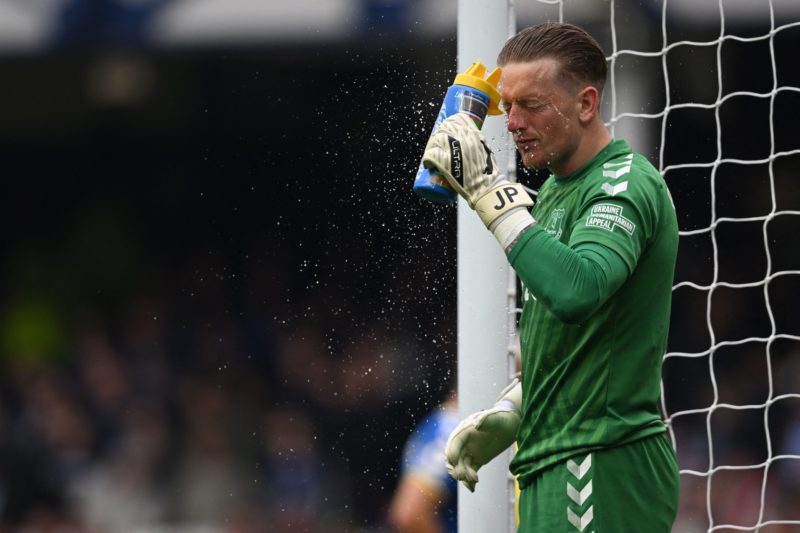 Everton's English goalkeeper Jordan Pickford cools off during the English Premier League football match between Everton and Chelsea at Goodison Park in Liverpool, north west England on May 1, 2022. (Photo by PAUL ELLIS/AFP via Getty Images)