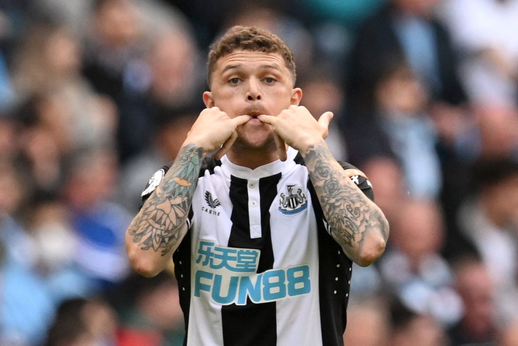 Newcastle United's English defender Kieran Trippier whistles to teammates during the English Premier League football match between Manchester City and Newcastle United at the Etihad Stadium in Manchester, north-west England, on May 8, 2022. (Photo by PAUL ELLIS/AFP via Getty Images)