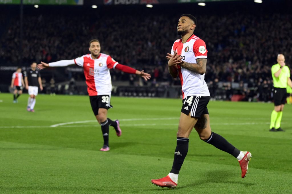 Feyenoord's Reiss Nelson (R) celebrates his team's second goal with Cyriel Dessers (L) during the UEFA Europa Conference League match between Feyenoord and Partizan at Feyenoord Stadium de Kuip in Rotterdam on March 17, 2022. (Photo by OLAF KRAAK/ANP/AFP via Getty Images)