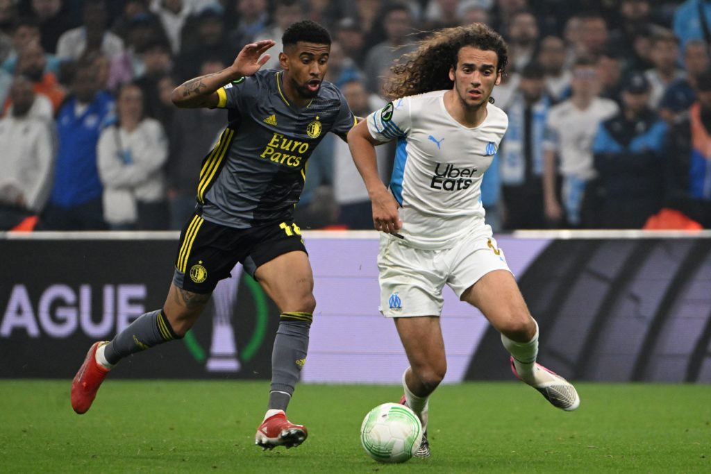 Feyenoord's Reiss Nelson (L) fights for the ball with Marseille's Matteo Guendouzi during the UEFA Europa Conference League semi-final second leg football match between Olympique de Marseille (OM) and Feyenoord Rotterdam, at the Velodrome Stadium in Marseille, on May 5, 2022. (Photo by CHRISTOPHE SIMON/AFP via Getty Images)