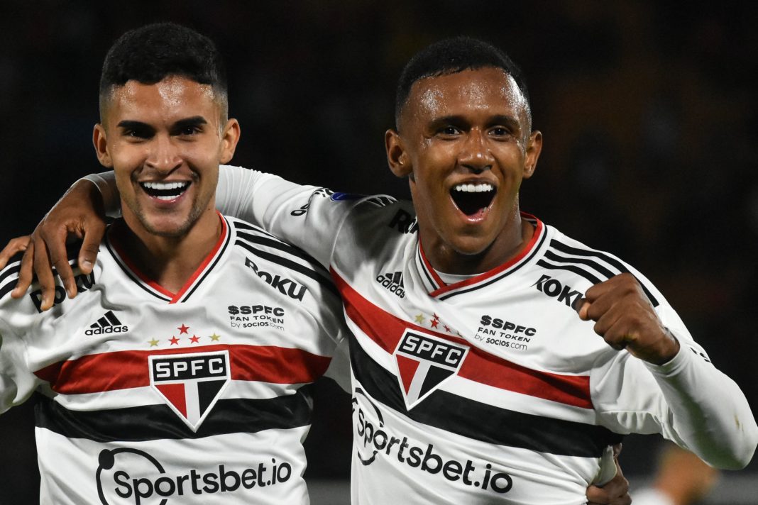 Brazil's Sao Paulo Marquinhos (R) celebrates with teammate Rodrigo Nestor after scoring the team's third goal against Bolivia's Jorge Wilstermann during their Copa Sudamericana group stage football match at the Felix Capriles stadium in Cochabamba, Bolivia, on April 28, 2022. (Photo by FERNANDO CARTAGENA/AFP via Getty Images)