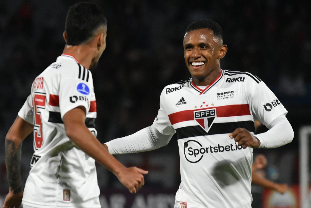 Brazil's Sao Paulo Marquinhos (R) celebrates with teammate Rodrigo Nestor after scoring the team's third goal against Bolivia's Jorge Wilstermann during their Copa Sudamericana group stage football match at the Felix Capriles stadium in Cochabamba, Bolivia, on April 28, 2022. (Photo by FERNANDO CARTAGENA/AFP via Getty Images)