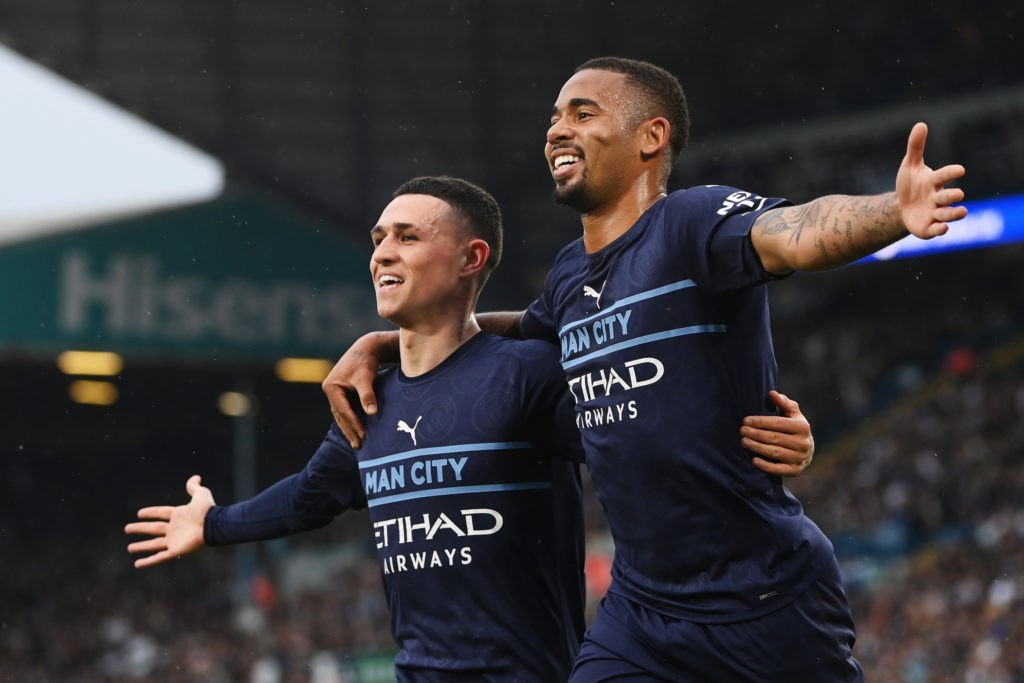 LEEDS, ENGLAND: Gabriel Jesus of Manchester City celebrates with teammate Phil Foden after scoring their side's third goal during the Premier League match between Leeds United and Manchester City at Elland Road on April 30, 2022. (Photo by Michael Regan/Getty Images)